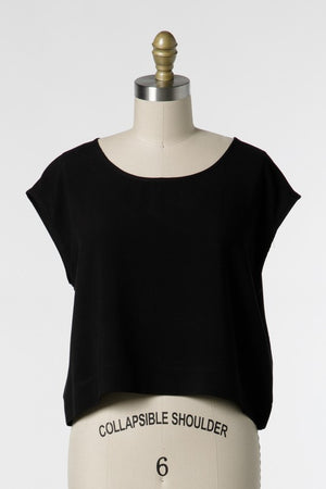 Woven Boxy Top with round neckline and short extended sleeves