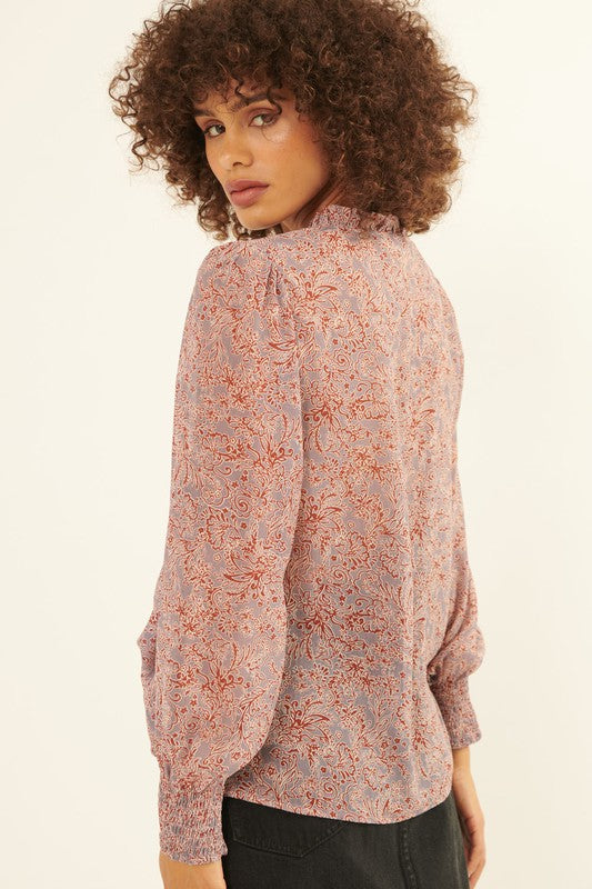 FLORAL V-NECK BLOUSE, lined, in an ash blue background floral print with smocking at wrist.