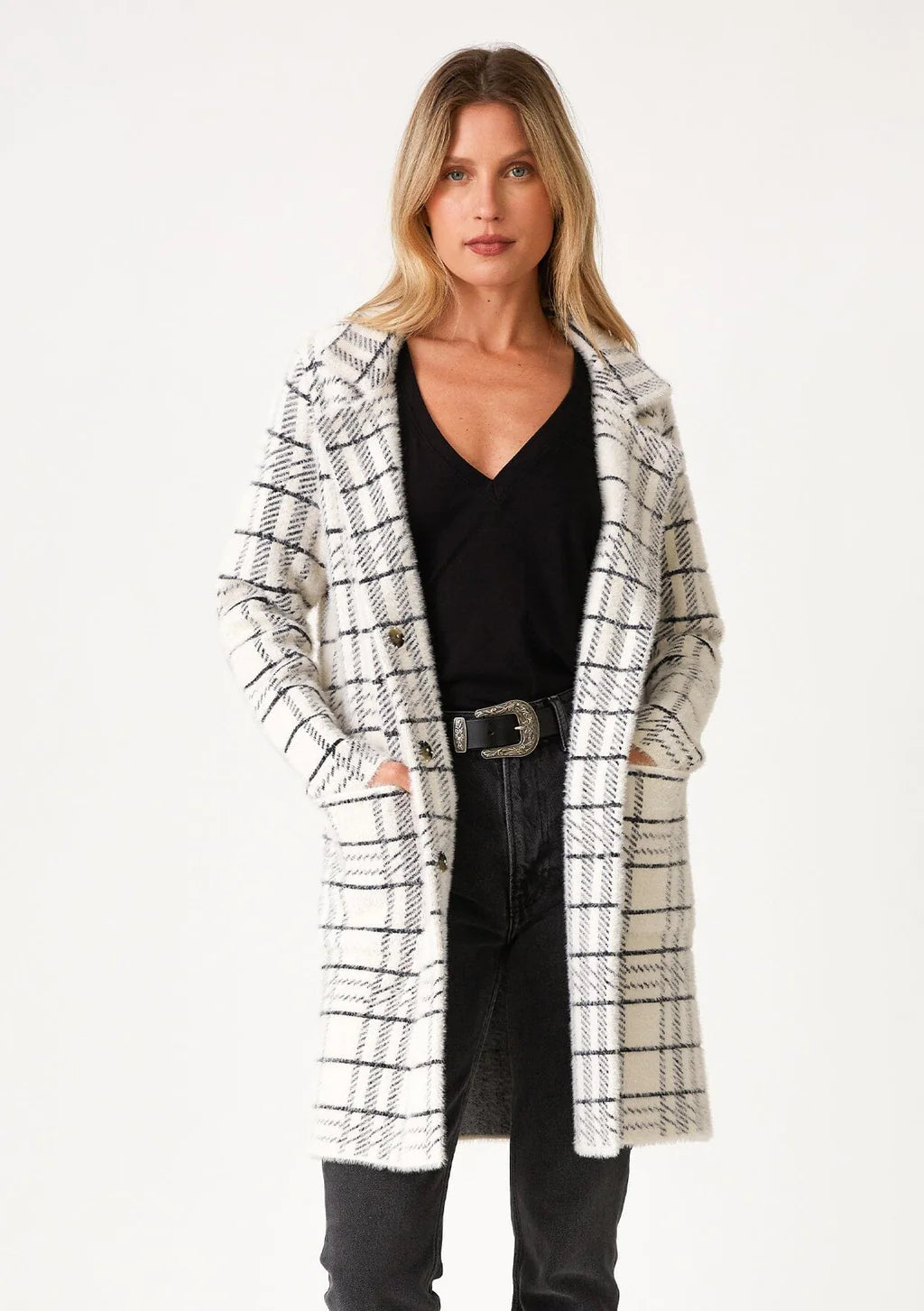 ultra-soft and fuzzy texture sweater coat with side pockets, a classic notched lapel, and a snap button front