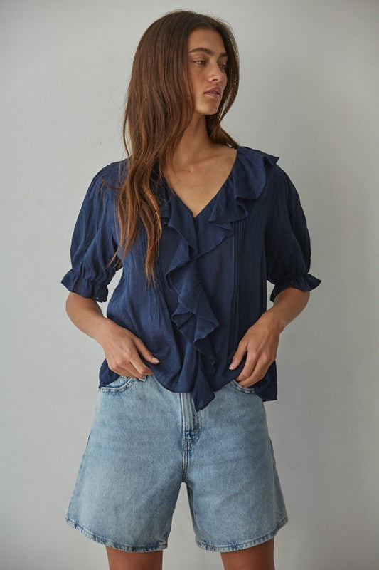 100% Cotton, Navy V-neck, ruffle detail top with 1/2 sleeve length and elastic ruffle band