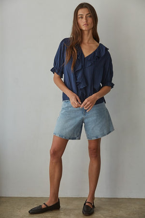 100% Cotton, Navy V-neck, ruffle detail top with 1/2 sleeve length and elastic ruffle band