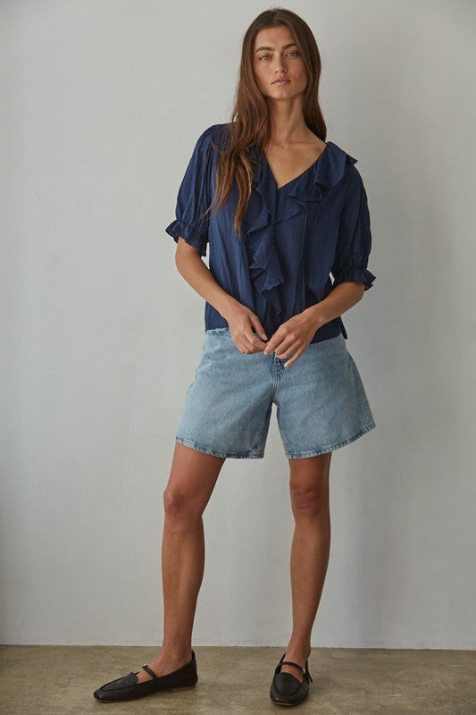 100% Cotton, Navy V-neck, ruffle detail top with 1/2 sleeve length and elastic ruffle band