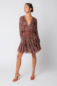 SMOCKED WAIST MINI DRESS in a graphic print in shades of brown/rust/cream/slate blue