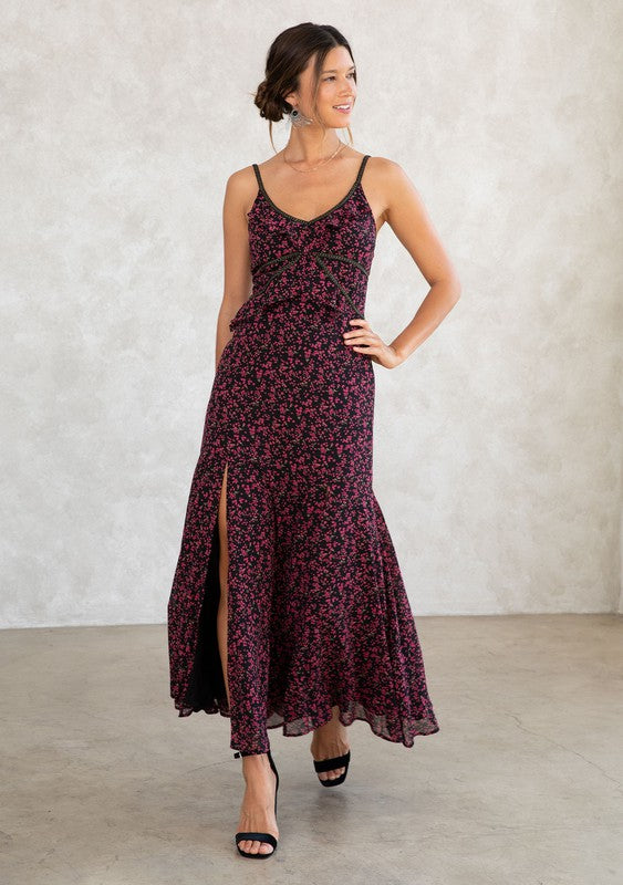 Chiffon Maxi Dress Ditsy Floral Print Slim Fit Top Ruffled Waist Detail Flowy A-Line Skirt Thigh-High Side Slits Ruffle-Trimmed V-Neckline Subtle Gold Thread Trim Adjustable Spaghetti Straps Concealed Back Zipper Lining Attached Not Sheer Color:  Black/Raspberry