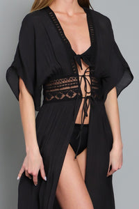 Black tie-front beach cover up with lace inset at waist