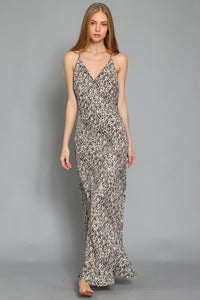 MAXI SLIP DRESS in a snake print with adjustable spaghetti straps and side slit (lined)