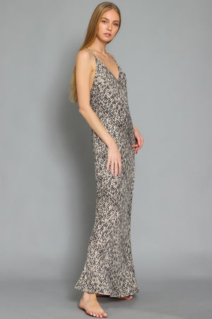 MAXI SLIP DRESS in a snake print with adjustable spaghetti straps and side slit (lined)