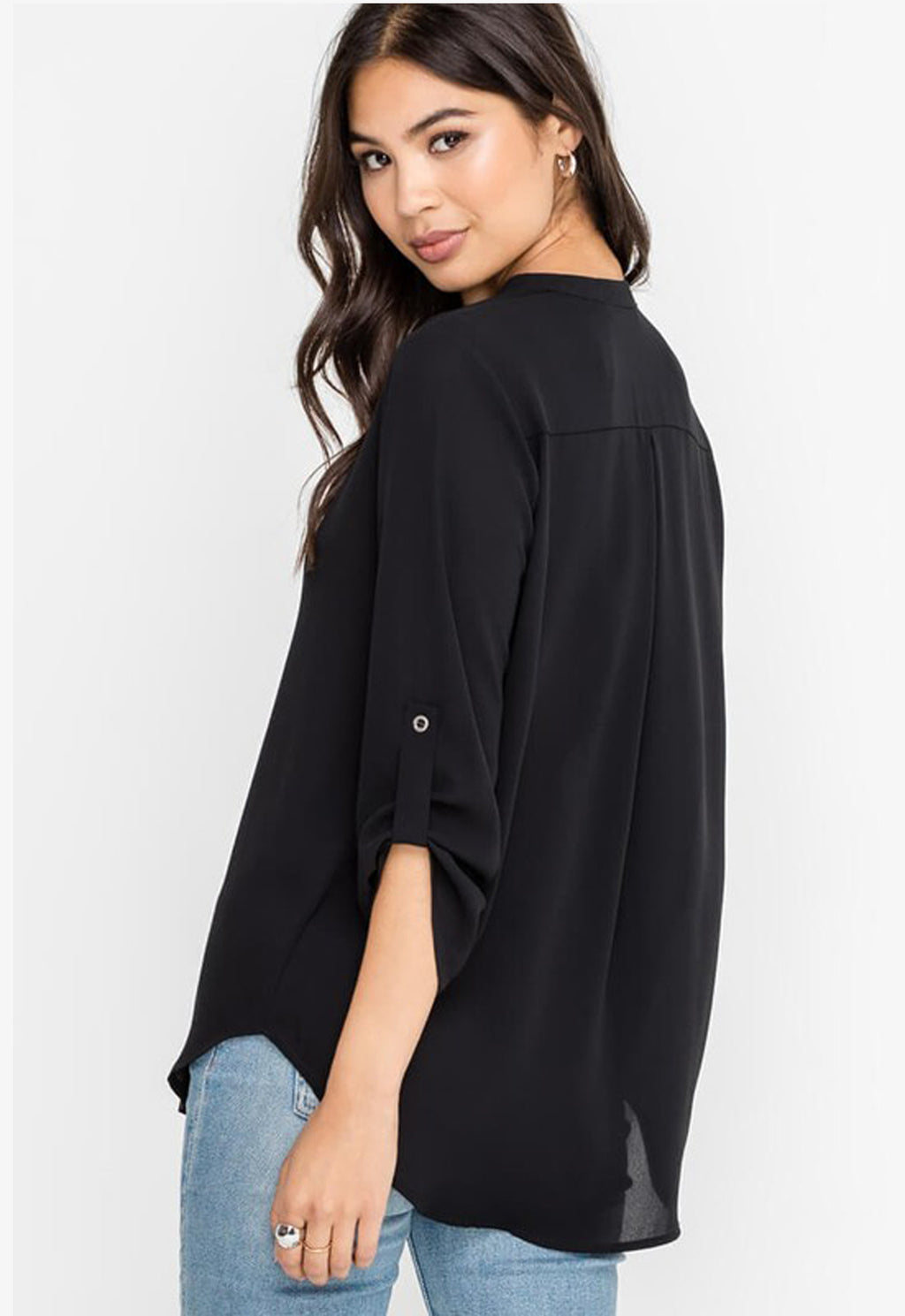 Ladies long sleeve flowy v-neck blouse in color black. By Lush Clothing