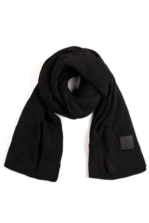 Ribbed knit scarf in black by c.c.