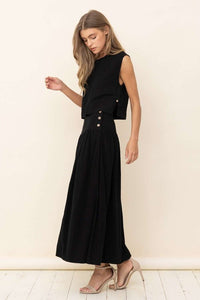 LINEN BLEND MAXI SLEEVELESS CROP TOP IN BLACK WITH SIDE SPLIT AND BUTTON CLOSURES ON BOTH SIDES.  BUTTON CLOSURE AT NECKLINE