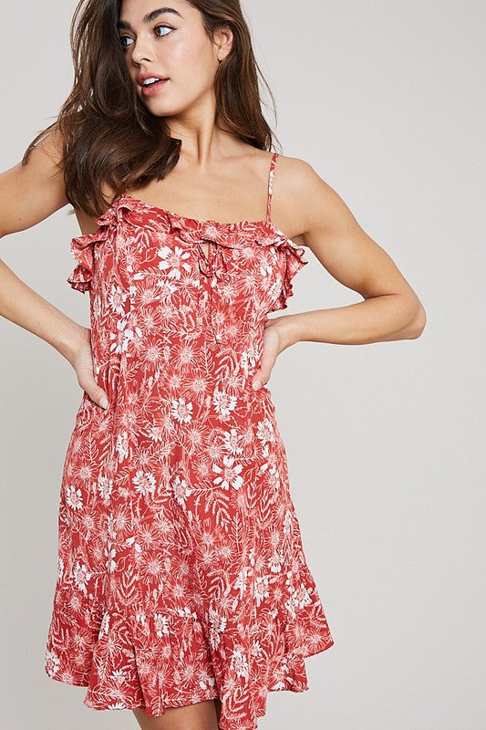 Spaghetti strap mini dress with adjustable straps and ruffle at bodice and hem by Wishlist