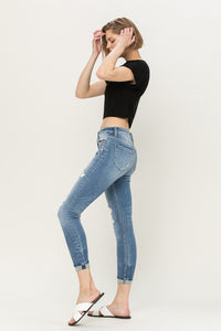 MID-RISE DISTRESSED CUFFED CROP SKINNY JEANS
