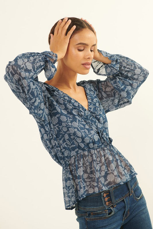 RUFFLED SURPLICE PEPLUM BLOUSE in a navy floral print
